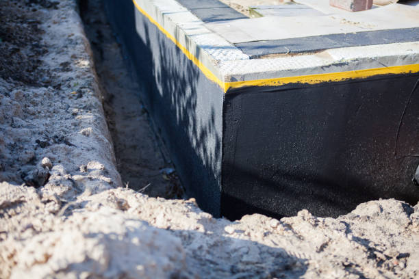 Professional Waterproofing technician working in Aniwa, WI